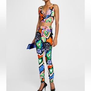 NEW season multi colored set pants a small very stretchy. Top size medium.